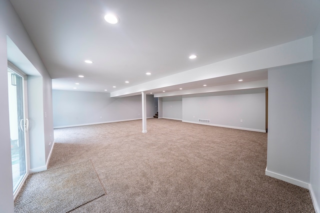 26015 E Huron River Dr, Flat Rock, MI 48134 - basement featuring carpet flooring, recessed lighting, and baseboards