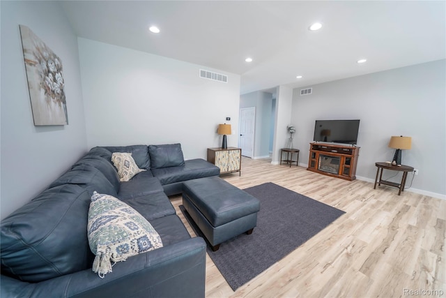 26015 E Huron River Dr, Flat Rock, MI 48134 - living area featuring light wood-style flooring, recessed lighting, and baseboards