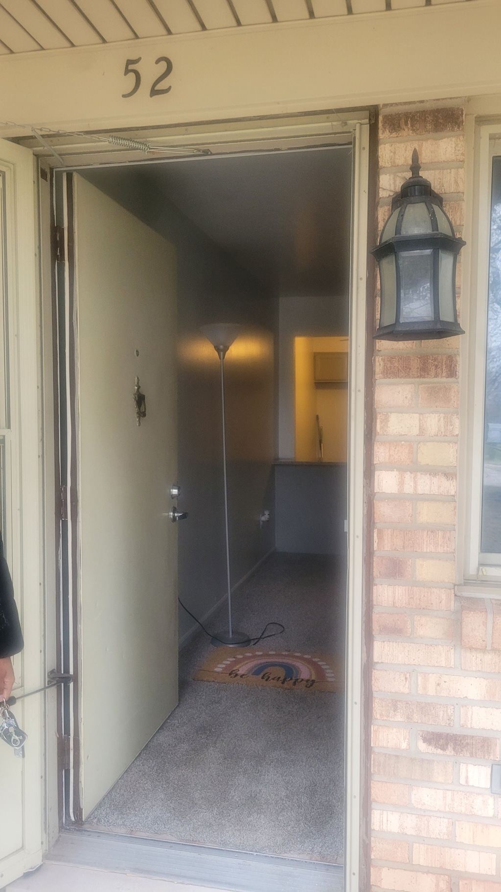 16050 Holz Dr Unit 52, Southgate, MI 48195 - view of exterior entry featuring brick siding
