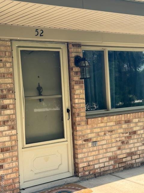 16050 Holz Dr Unit 52, Southgate, MI 48195 - view of exterior entry with brick siding