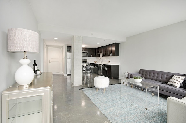 3320 Spinnaker Ln Unit 2E, Detroit, MI 48207 - living area featuring concrete floors and recessed lighting