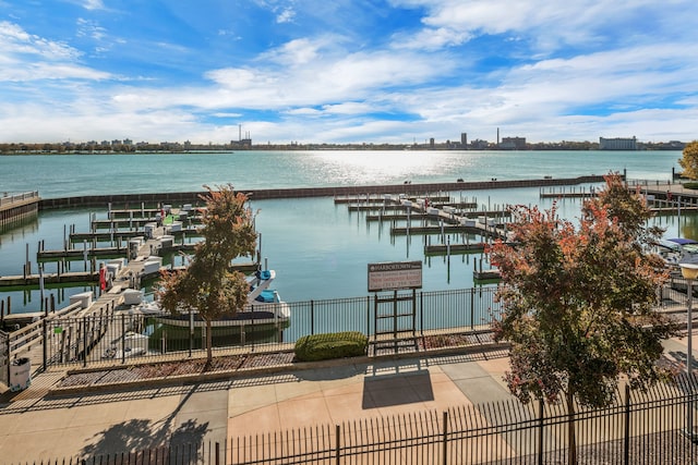 3320 Spinnaker Ln Unit 2E, Detroit, MI 48207 - water view featuring a dock