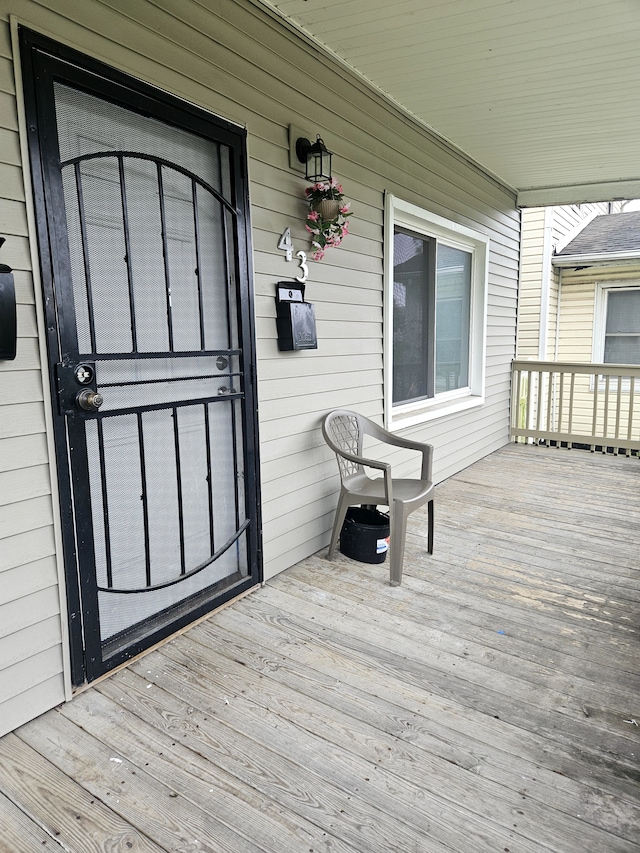 wooden deck featuring a porch