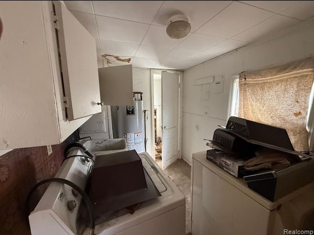 8558 Messmore Rd, Shelby Twp, MI 48317 - washroom with gas water heater and washer / dryer