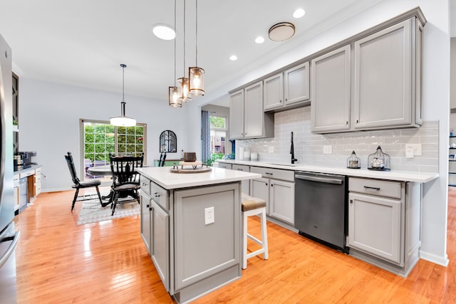 kitchen with dishwasher, gray cabinets, tasteful backsplash, and recessed lighting