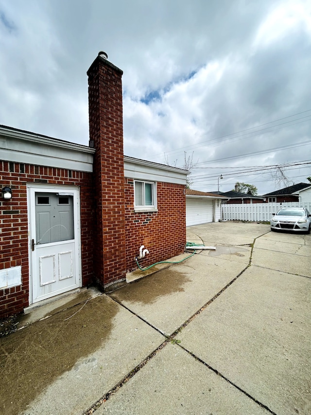30101 Matthew St, Westland, MI 48186 - view of home's exterior with brick siding and a chimney