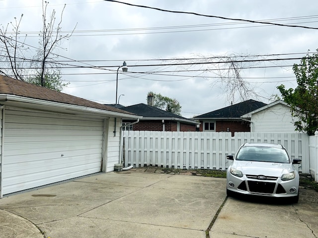 30101 Matthew St, Westland, MI 48186 - garage with fence and driveway