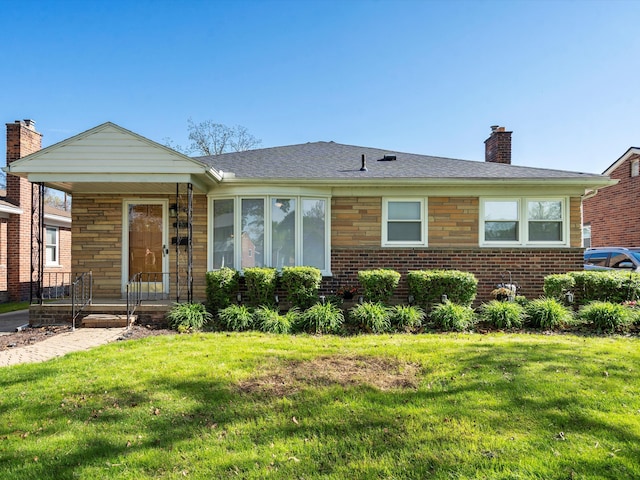 22615 Edgewood St, Saint Clair Shores, MI 48080 - view of front of home featuring a front yard, a chimney, brick siding, and a porch