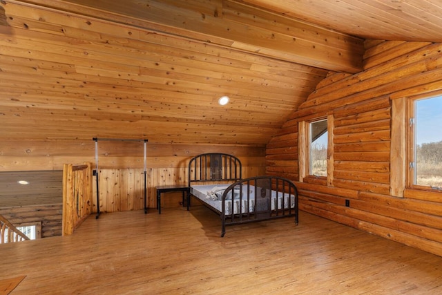 11840 Schreiner Rd, Bellevue, MI 49021 - bedroom featuring wooden ceiling, lofted ceiling, rustic walls, and wood finished floors