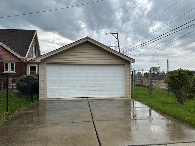 garage with fence