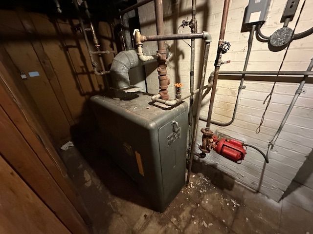 utility room with a heating unit