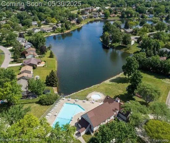 40409 Oak Tree, Novi, MI 48375 - aerial view of property's location featuring a pool area and a nearby body of water