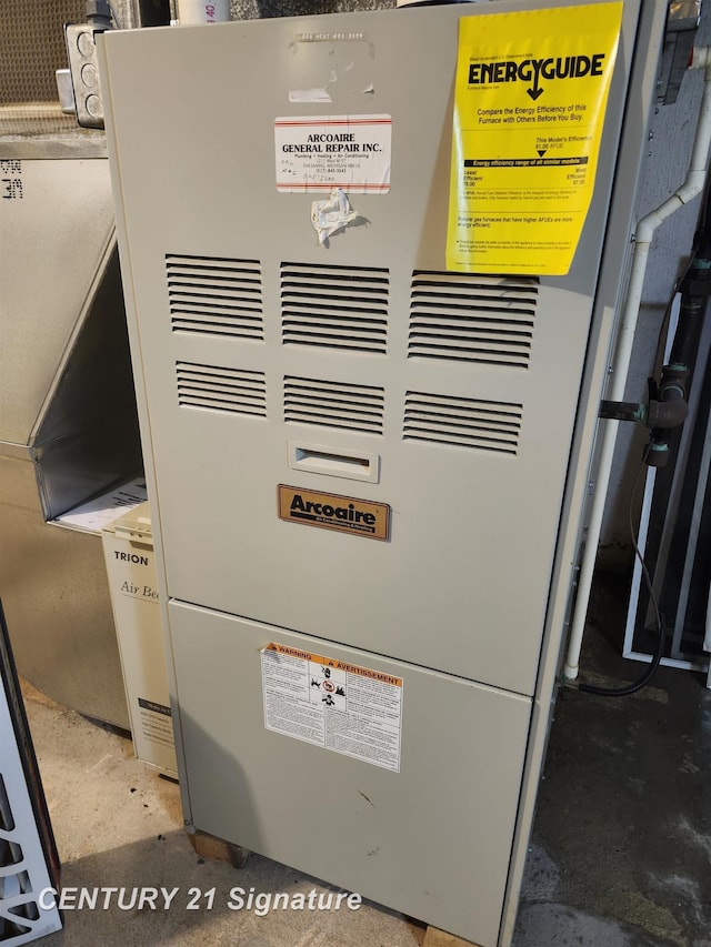 12595 Brant Rd, Saginaw, MI 48655 - utility room featuring heating unit
