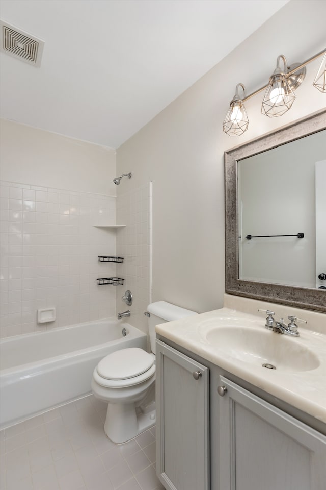 bathroom with tile patterned flooring, toilet, shower / bath combination, and vanity