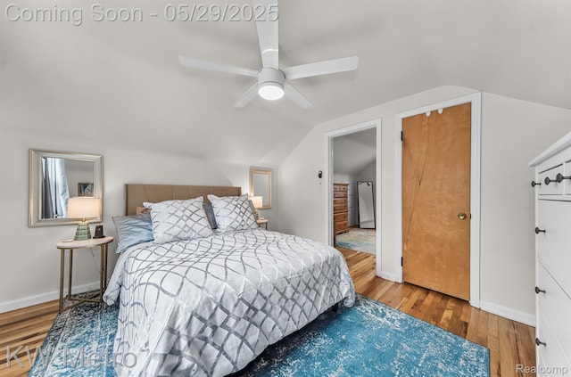 1930 N Wilson Ave, Royal Oak, MI 48073 - bedroom featuring wood finished floors, vaulted ceiling, refrigerator, baseboards, and ceiling fan