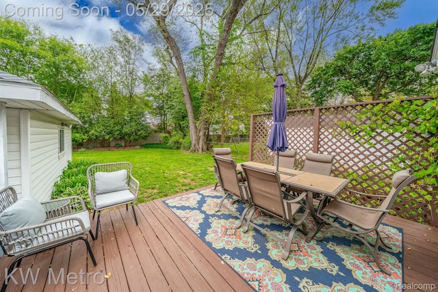 1930 N Wilson Ave, Royal Oak, MI 48073 - wooden deck with outdoor dining area and view of wooded area