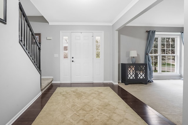 2435 Ivy Hill Dr, Commerce Twp, MI 48382 - entrance foyer featuring stairs, dark wood-style flooring, baseboards, and crown molding