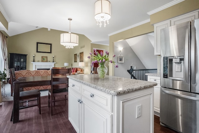 2435 Ivy Hill Dr, Commerce Twp, MI 48382 - kitchen featuring lofted ceiling, dark wood finished floors, white cabinetry, a center island, and stainless steel fridge with ice dispenser