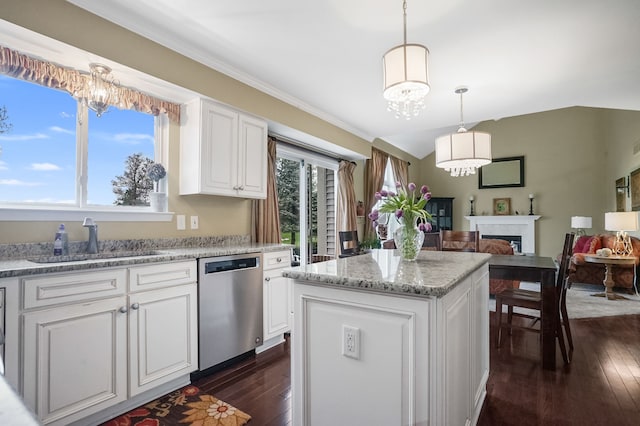 2435 Ivy Hill Dr, Commerce Twp, MI 48382 - kitchen featuring an inviting chandelier, dark wood finished floors, stainless steel dishwasher, and a sink
