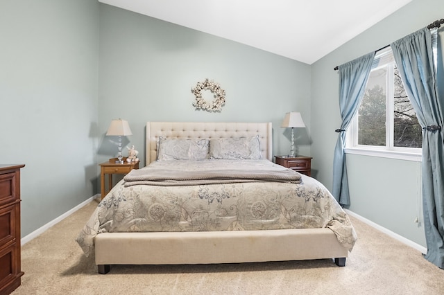 2435 Ivy Hill Dr, Commerce Twp, MI 48382 - carpeted bedroom with baseboards and vaulted ceiling