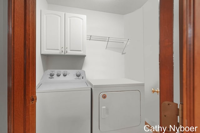 4330 Aspen Trails Dr NE, Grand Rapids, MI 49546 - washroom featuring cabinet space and washer and dryer