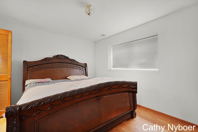 4330 Aspen Trails Dr NE, Grand Rapids, MI 49546 - bedroom featuring light wood-type flooring and baseboards