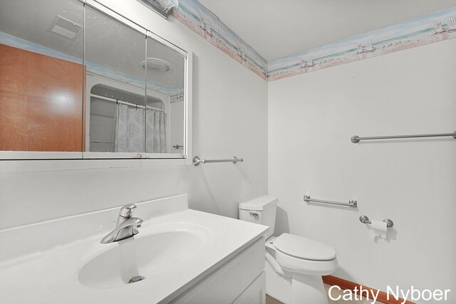 4330 Aspen Trails Dr NE, Grand Rapids, MI 49546 - full bath with a shower with shower curtain, toilet, and vanity