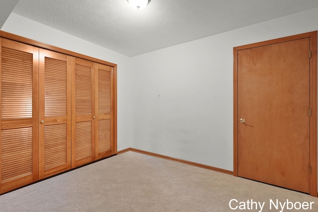 4330 Aspen Trails Dr NE, Grand Rapids, MI 49546 - unfurnished bedroom with carpet flooring, a closet, and baseboards