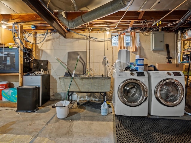 washroom with electric panel and independent washer and dryer