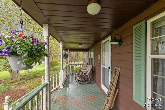 16617 W Stanton Rd, Pierson, MI 49339 - wooden terrace with covered porch