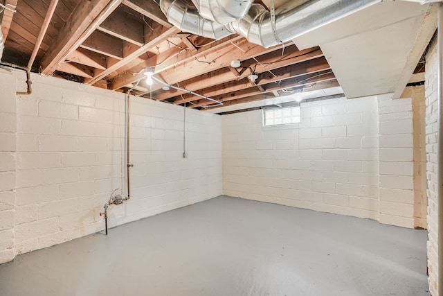 below grade area with concrete block wall