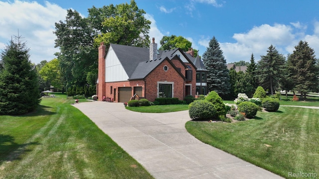 1947 Maplewood Ave, Bloomfield Hills, MI 48302 - view of front of house featuring brick siding, concrete driveway, a chimney, and a front yard