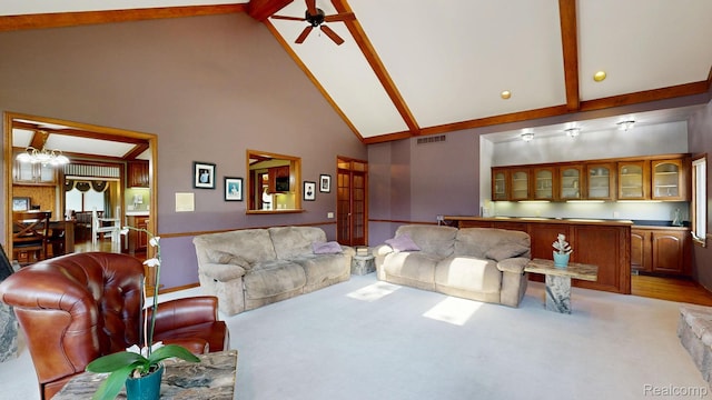 1947 Maplewood Ave, Bloomfield Hills, MI 48302 - living room with high vaulted ceiling, beam ceiling, light colored carpet, and ceiling fan