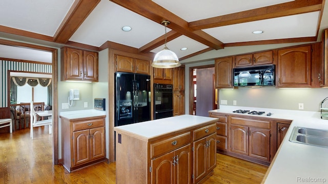 1947 Maplewood Ave, Bloomfield Hills, MI 48302 - kitchen featuring black appliances, light countertops, brown cabinetry, and recessed lighting
