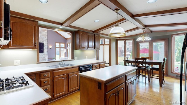 1947 Maplewood Ave, Bloomfield Hills, MI 48302 - kitchen featuring light countertops, a center island, light wood finished floors, white gas stovetop, and recessed lighting