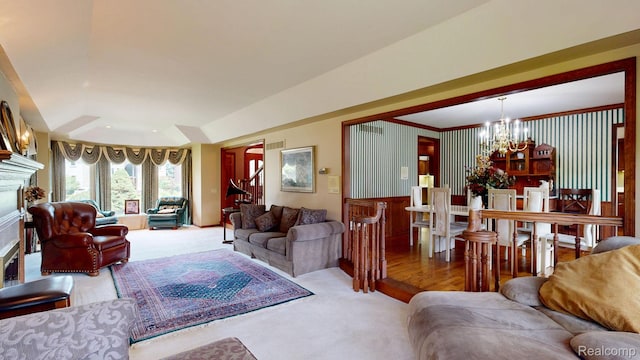 1947 Maplewood Ave, Bloomfield Hills, MI 48302 - living room with a chandelier, carpet flooring, and a fireplace