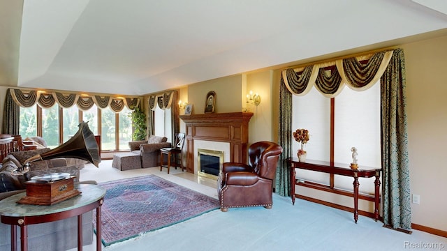 1947 Maplewood Ave, Bloomfield Hills, MI 48302 - carpeted living room featuring a fireplace with flush hearth and baseboards