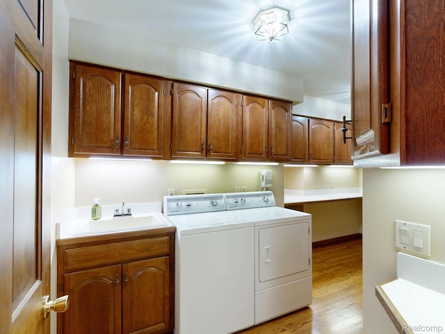 1947 Maplewood Ave, Bloomfield Hills, MI 48302 - washroom with separate washer and dryer, cabinet space, and light wood finished floors