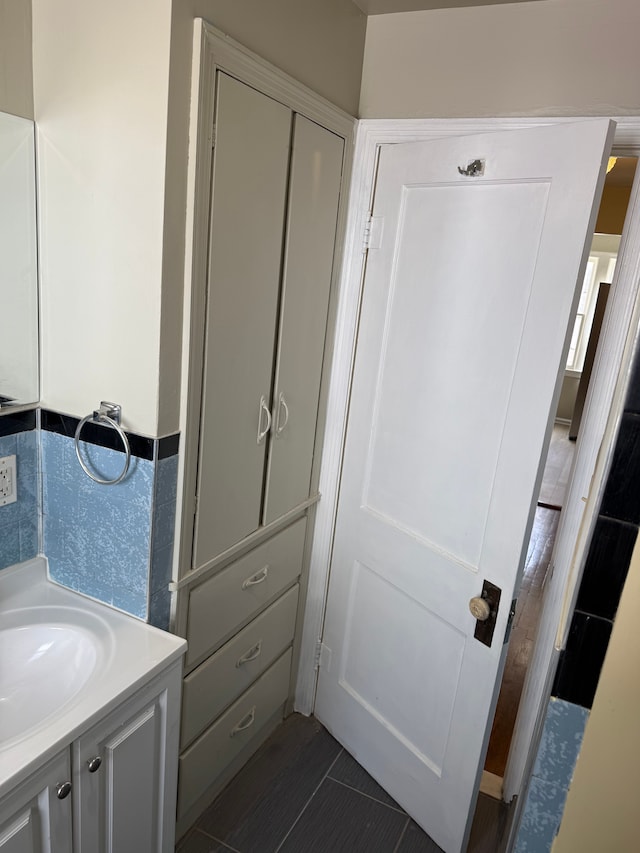 609 Buckingham Ave, Flint, MI 48507 - bathroom featuring vanity and tile patterned floors