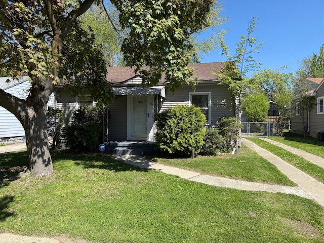 609 Buckingham Ave, Flint, MI 48507 - view of front of home featuring a shingled roof
