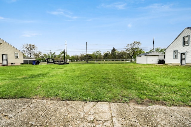 view of yard featuring a garage
