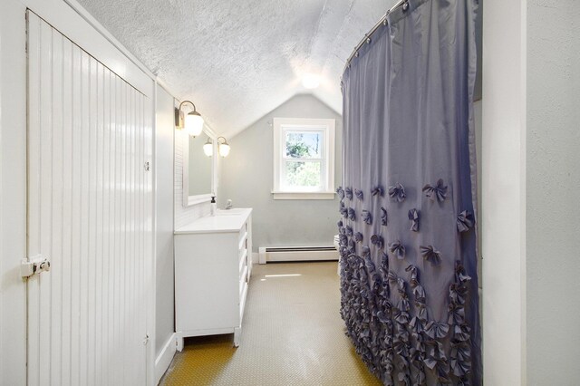 bathroom featuring a baseboard radiator, a textured ceiling, lofted ceiling, vanity, and a shower with curtain
