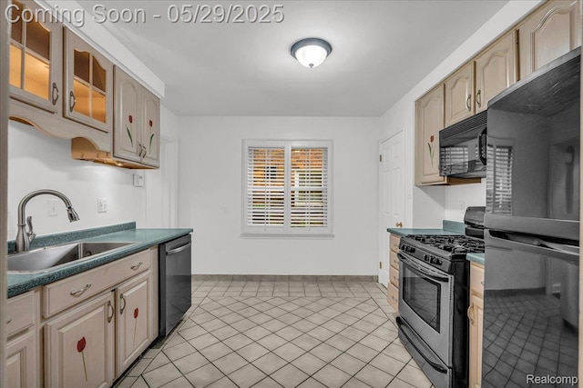 4800 Bishop St, Detroit, MI 48224 - kitchen with stainless steel appliances, a sink, baseboards, glass insert cabinets, and light tile patterned floors