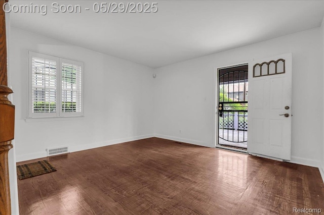 4800 Bishop St, Detroit, MI 48224 - empty room featuring wood finished floors and baseboards