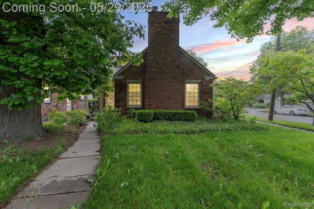 4800 Bishop St, Detroit, MI 48224 - view of front facade with a chimney and brick siding