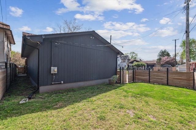 exterior space featuring a yard and a fenced backyard