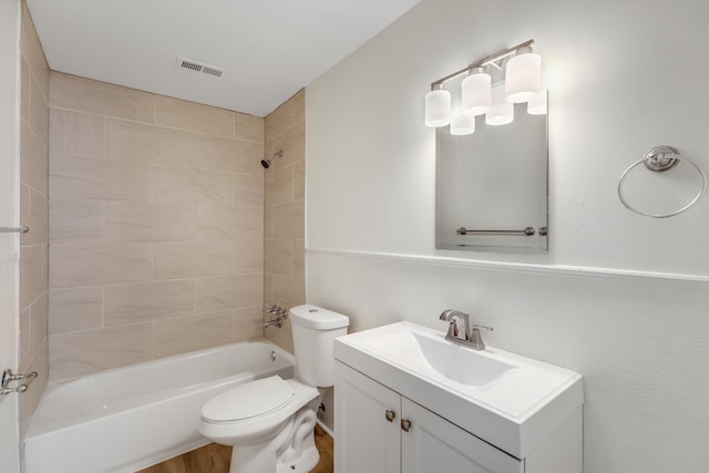 full bathroom with toilet, shower / tub combination, vanity, and wood finished floors