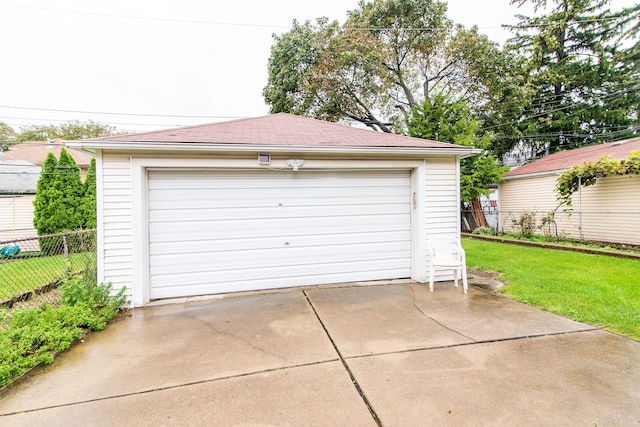 detached garage with fence