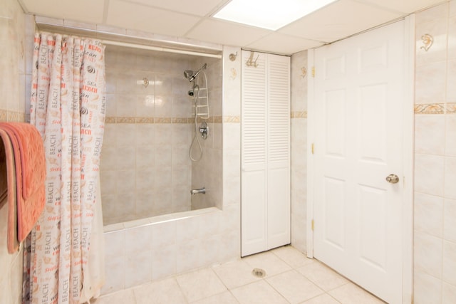bathroom with tile patterned floors