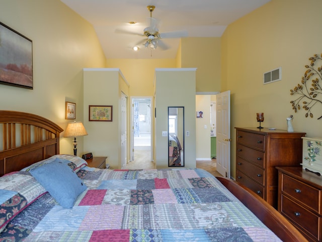 bedroom featuring visible vents and high vaulted ceiling
